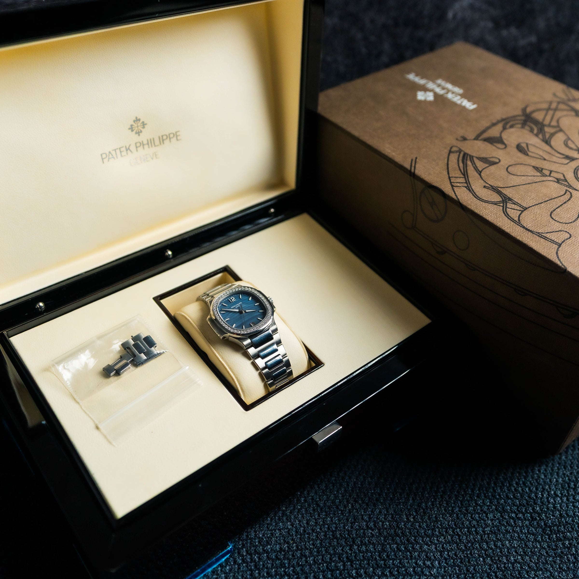 PATEK PHILIPPE NAUTILUS 7018/1A-010 STAINLESS STEEL BLUE DIAL DIAMONDS